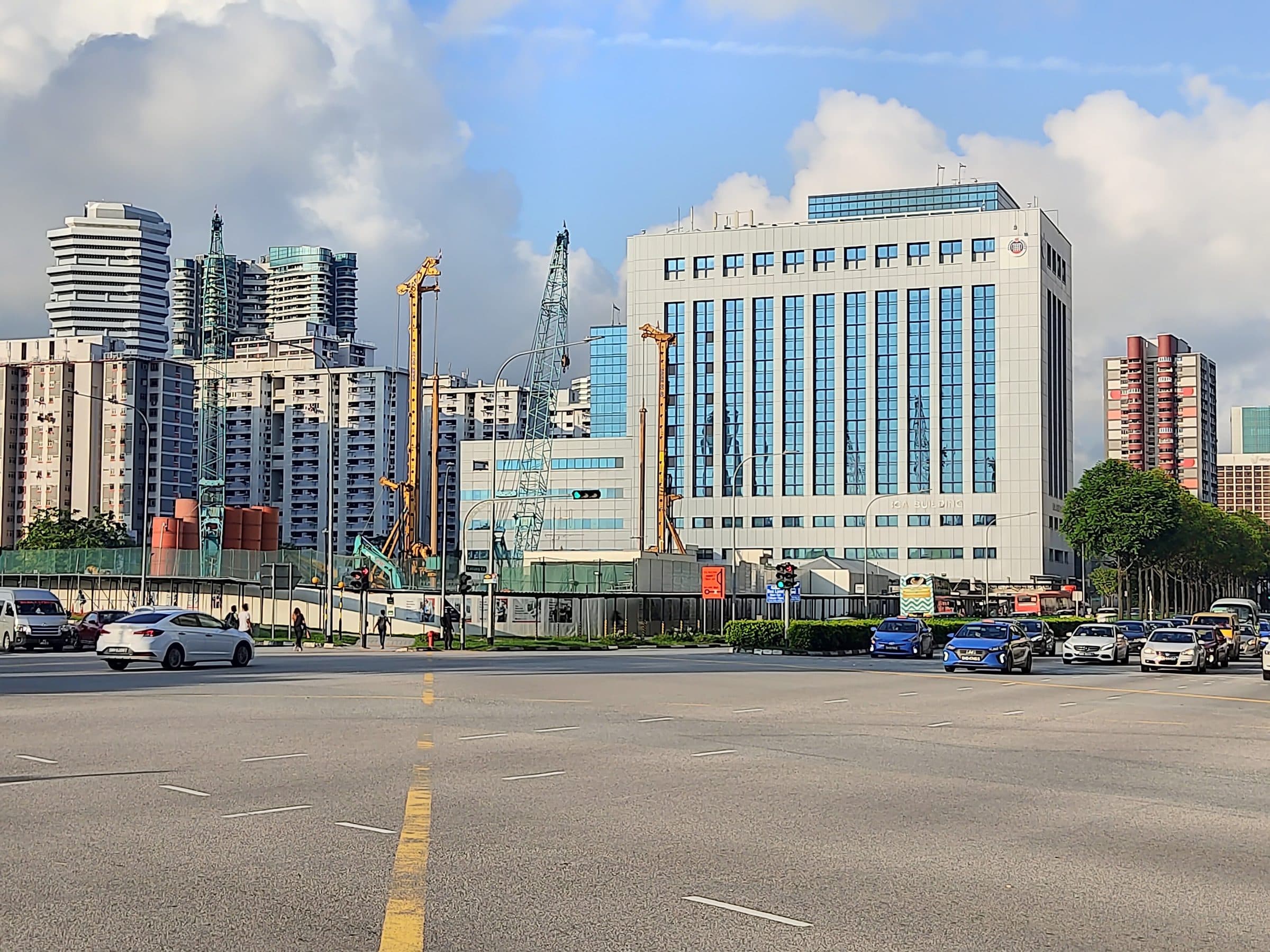The Immigration & Checkpoints Authority building in Singapore, seen from the street on a clear morning